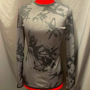 Ladies Under Armour all season gear long sleeve shirt. Sz. Small, reversible